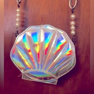 Iridescent silver sea shell purse with pearl details